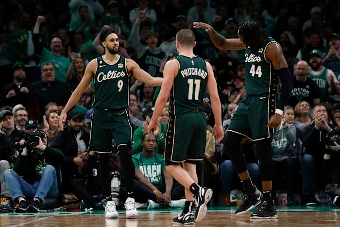 Boston Celtics guard Derrick White, guard Payton Pritchard, center Robert Williams